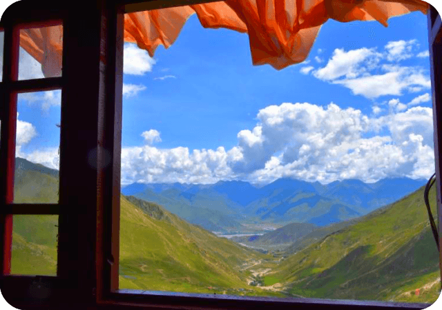 Looking out from one of the temples at Drak Yerpa	▏hi@tibet4fun.com